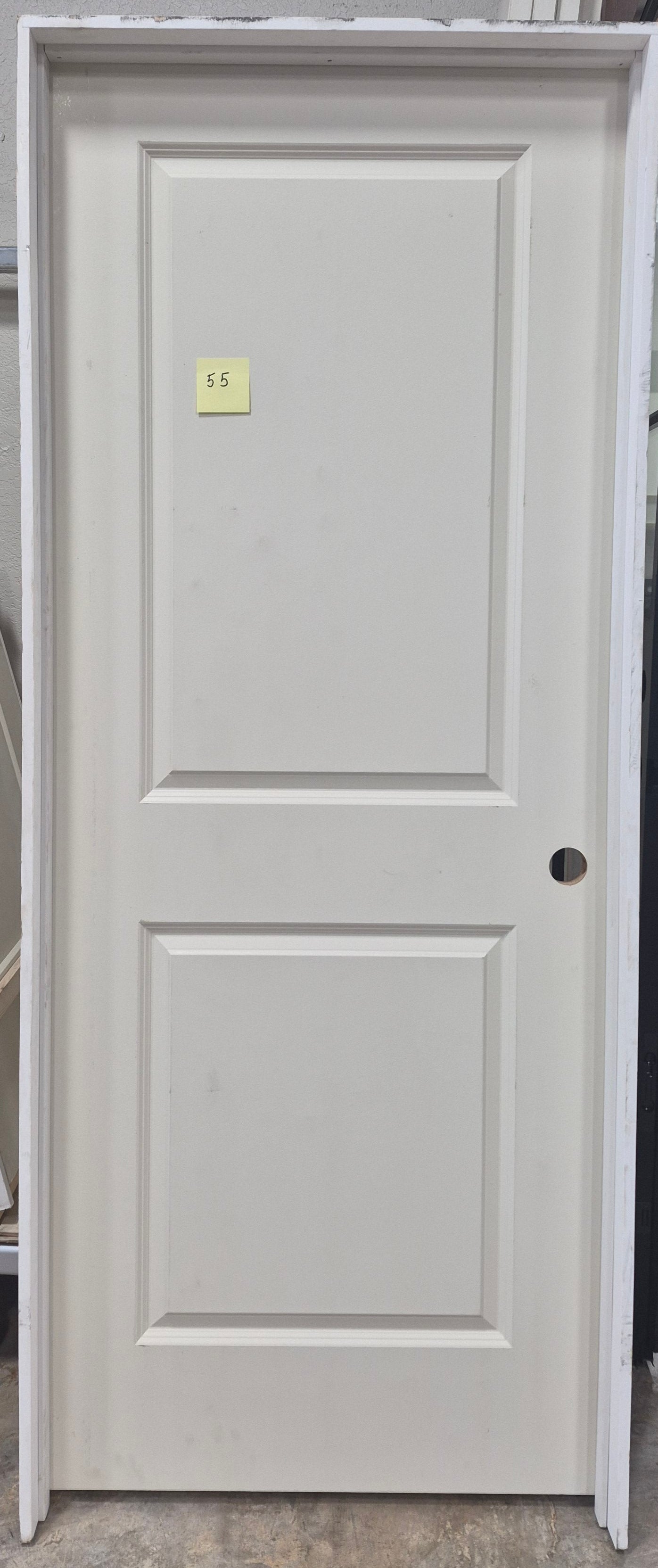 CLEARANCE - Door 55 - Pre-hung Left Hand Swing 2/8(32")x6/8(80")x 1-3/8" Primed Molded Smooth 2-Panel Raised Carrara Hollow Core